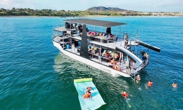 The 55-foot boat with its slide down and water toys out